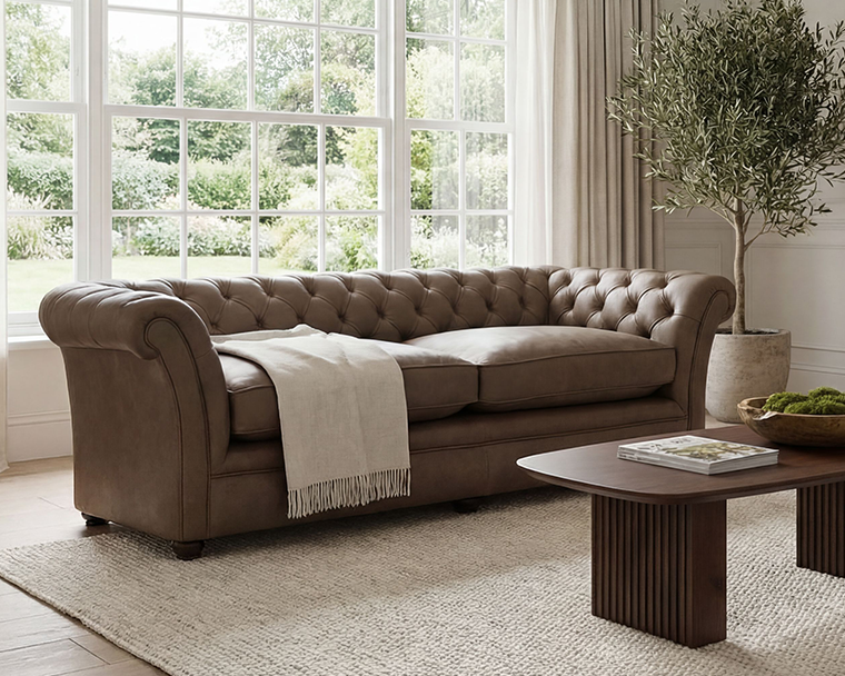 Flared arms, Hand pleated details, Classic Chesterfield Design