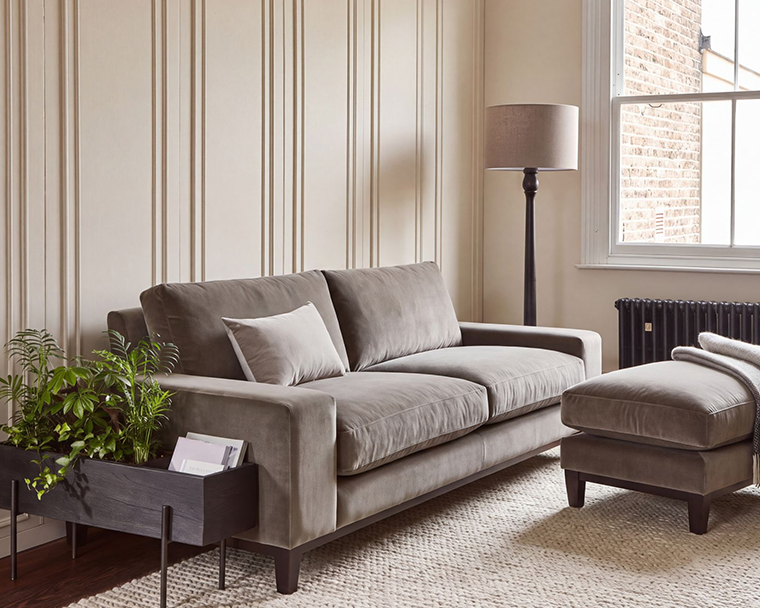 Wide arms, Contemporary design, Minimalist silhouette, Elevated on slim legs