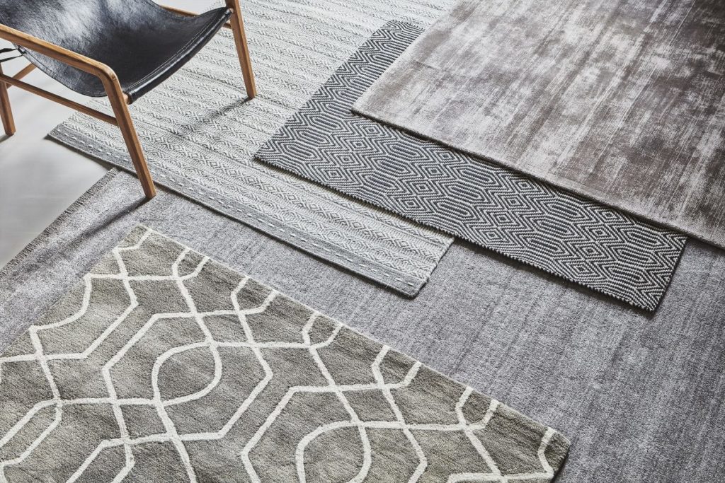 Layering rugs for texture Scandi style